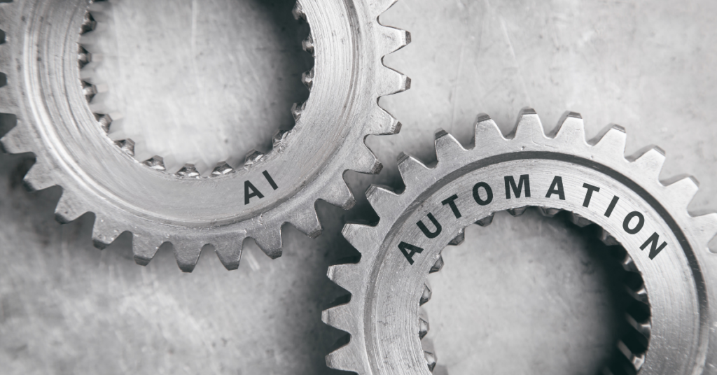 Close-up of two interlocking metal gears labeled 'AI' and 'Automation,' symbolizing the integration of artificial intelligence and automation in modern marketing strategies